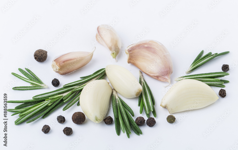 Garlic with rosemary, black pepper isolated on white background. Isolated garlic