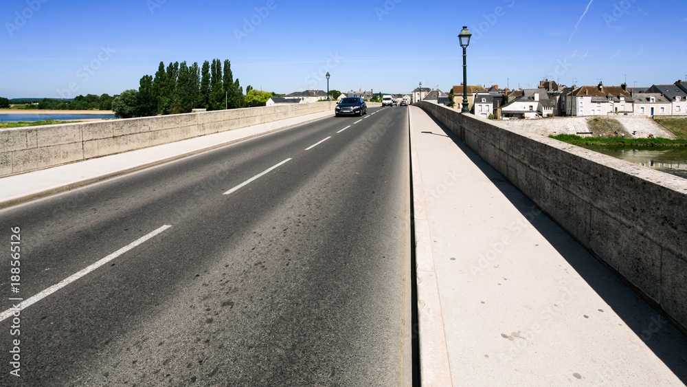 Fototapeta premium car traffic on bridge over Loire river in Amboise