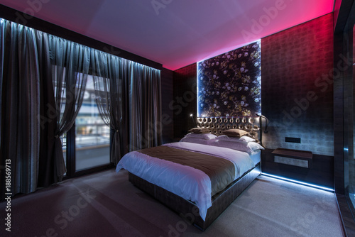 Hotel room interior, luxury bedroom in modern hotel