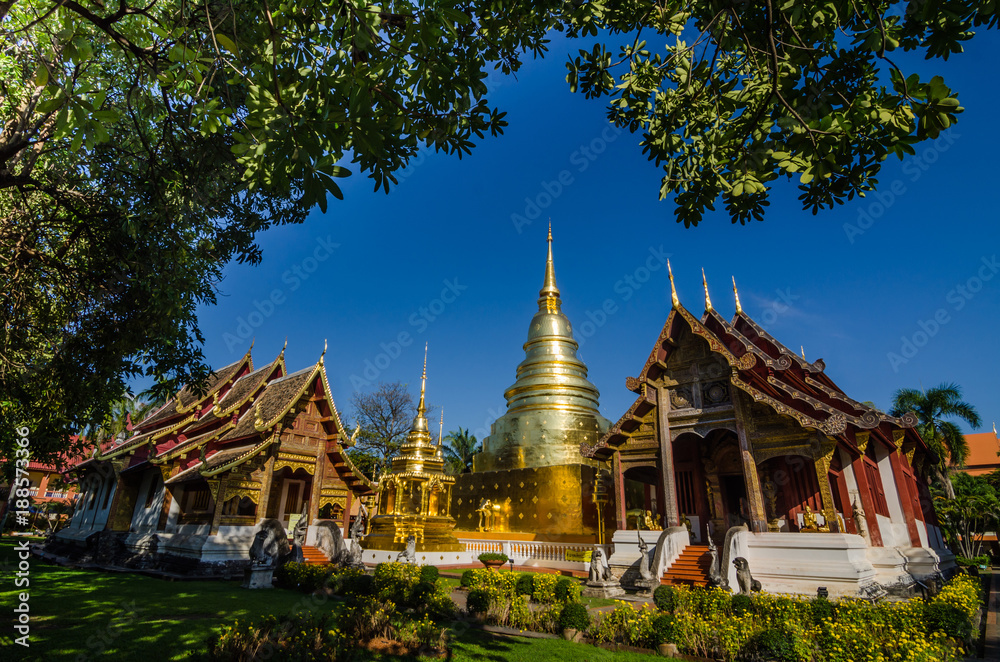 Naklejka premium Old Church and golden pagoda at phra singh temple