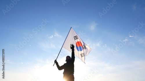 Male fan with South Korean flag rejoices and supports athletes © Nikita Vasilchenko
