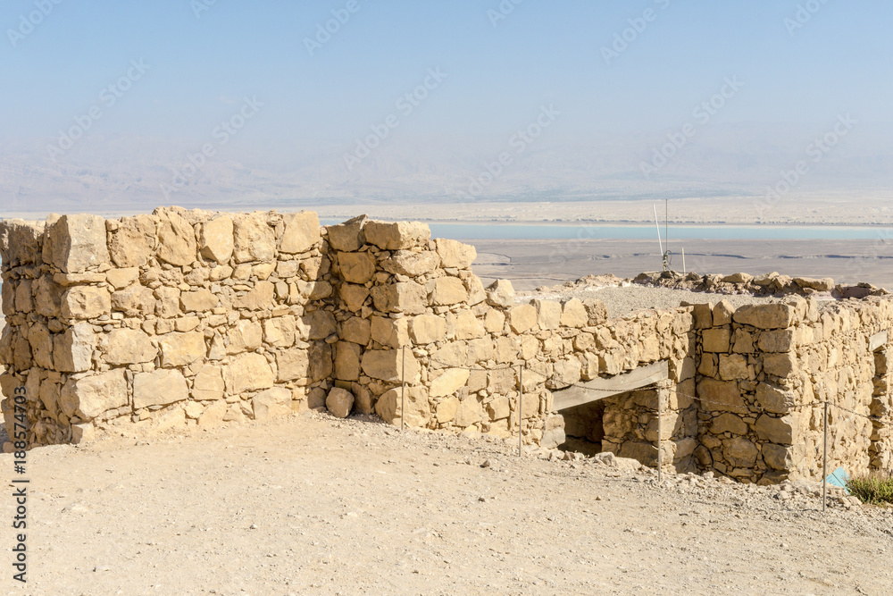 Ruins of the ancient fortress of Massada on the mountain near the dead sea in southern Israel

