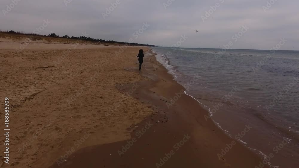 Baltic sea in Poland. Birds view. View on sandy beach - Poland, Rewal, Baltic sea. Aerial. Baltic sea in Poland. Birds view. View on sandy beach - Poland, Rewal, Baltic sea. Aerial.