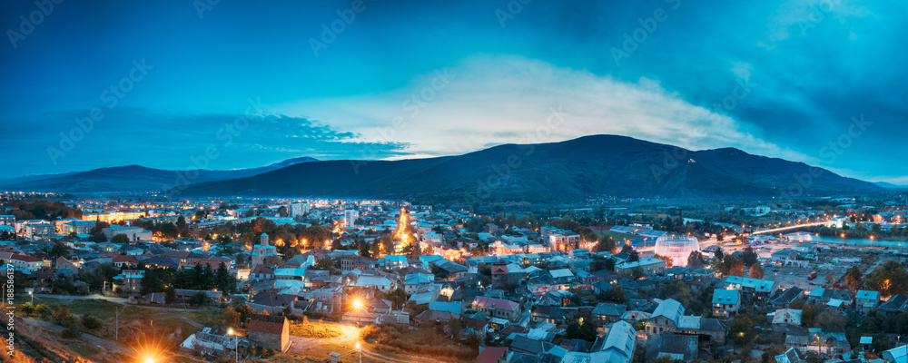 Gori, Shida Kartli Region, Georgia. Panoramic Cityscape In Evening