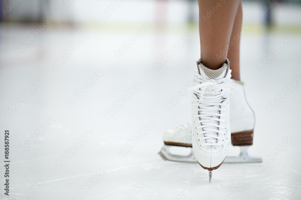 Figure Skates Close Up on Ice - obrazy, fototapety, plakaty 