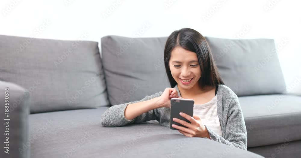 Woman playing the game on cellphone and being the winner at the end Woman playing the game on cellphone and being the winner at the end