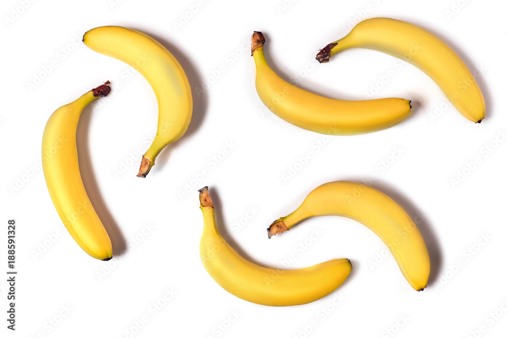 Ripe yellow bananas on a white background