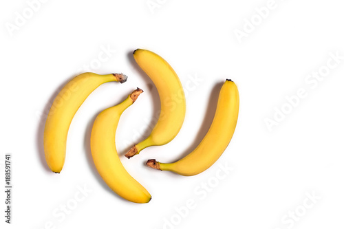 Ripe yellow bananas on a white background