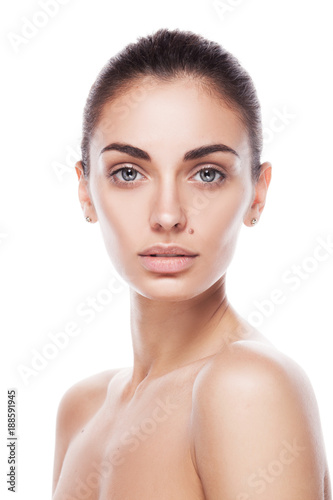 closeup portrait of young adult woman with clean fresh skin isolated