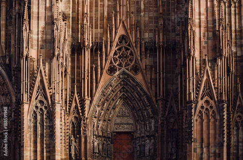 Architectural fragment of central entrance of the Strasbourg cathedral. Gothic decorative elements on Roman Catholic Cathedral. Alsace, France.