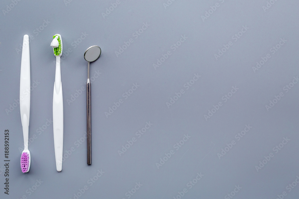Clean teeth. Brushes on blue background top view copy space Clean teeth. Brushes on blue background top view copy space