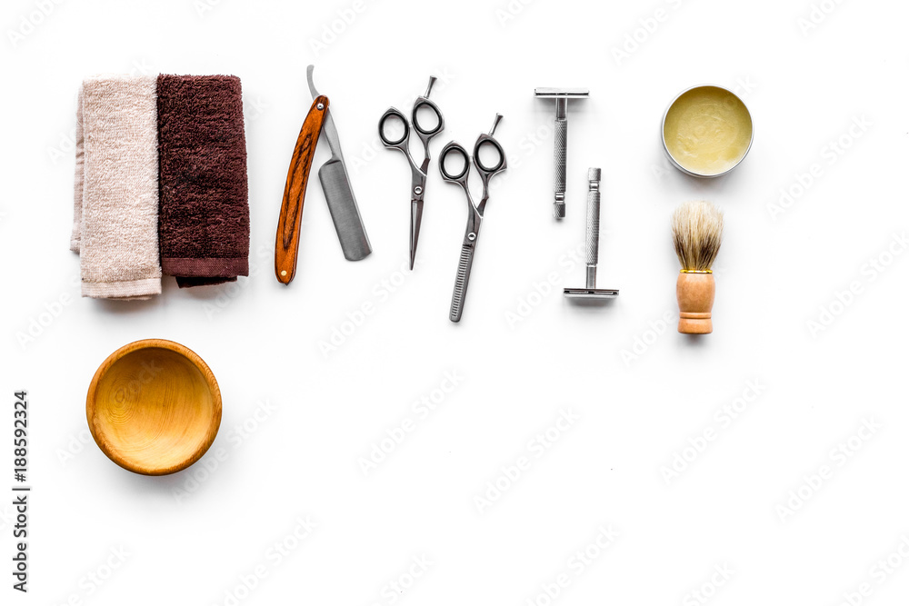 Tools beard and moustaches' care. Razor, brush and sciccors on white background top view copy space