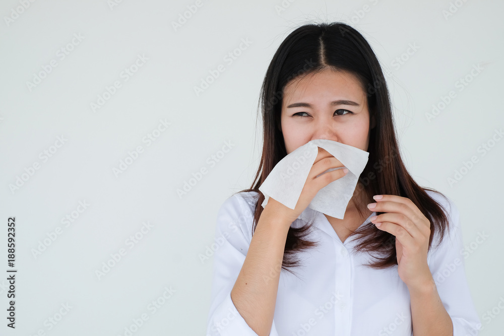 close up asian woman holding tissue in hand for reaction sneezing close up asian woman holding tissue in hand for reaction sneezing