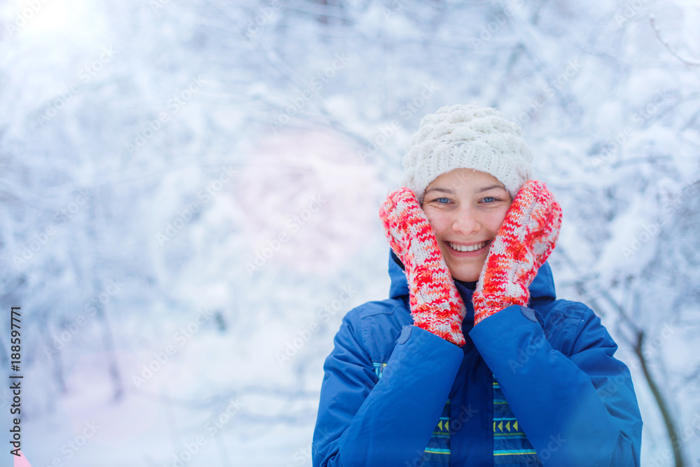 Beautiful young girl in winter park Beautiful young girl in winter park