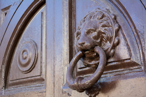 Horizontal View of an Old Clapper on an Ancient Wooden Door