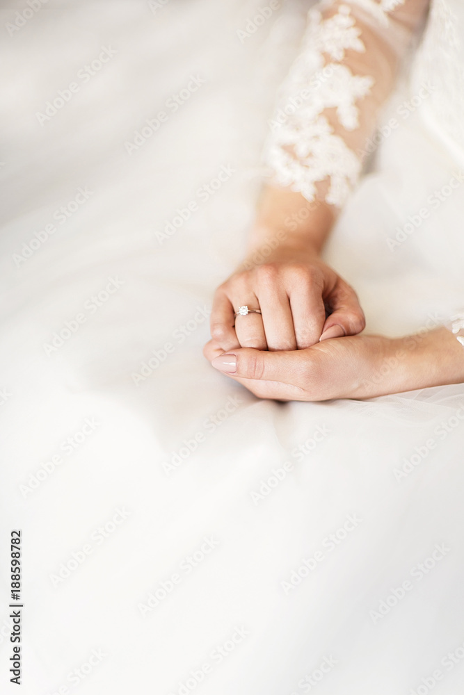 Engagement ring on bride's finger Engagement ring on bride's finger