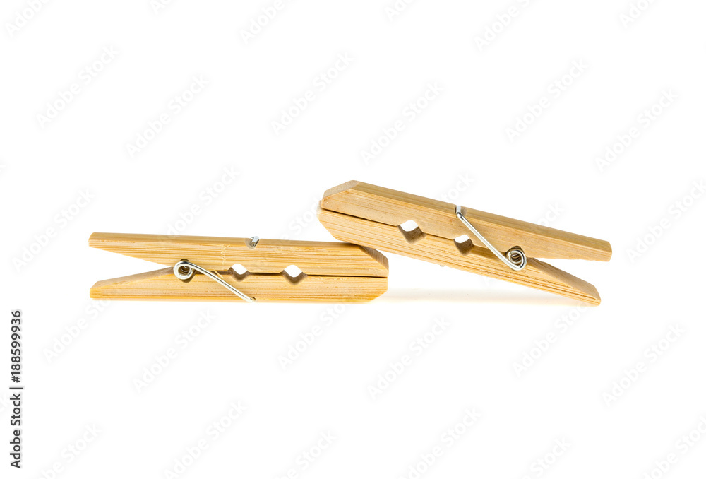 two clothespins of bamboo on a white background two clothespins of bamboo on a white background