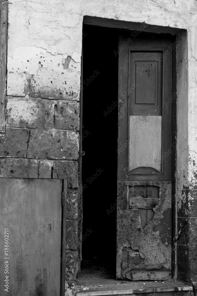 Ruined and Broken Facade With an Open Door With a Broken Glass, Ruined and Broken Facade With an Open Door With a Broken Glass,