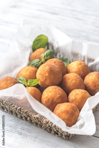 Rustic bowl of arancini photo