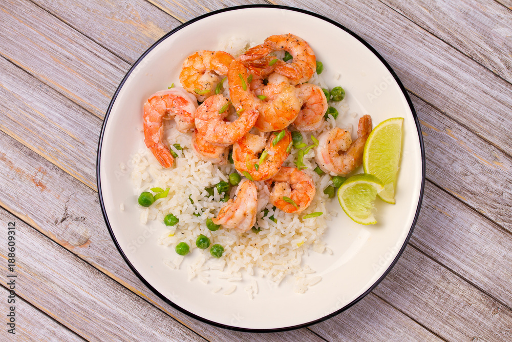 Shrimps with rice and peas. View from above, top, horizontal Shrimps with rice and peas. View from above, top, horizontal