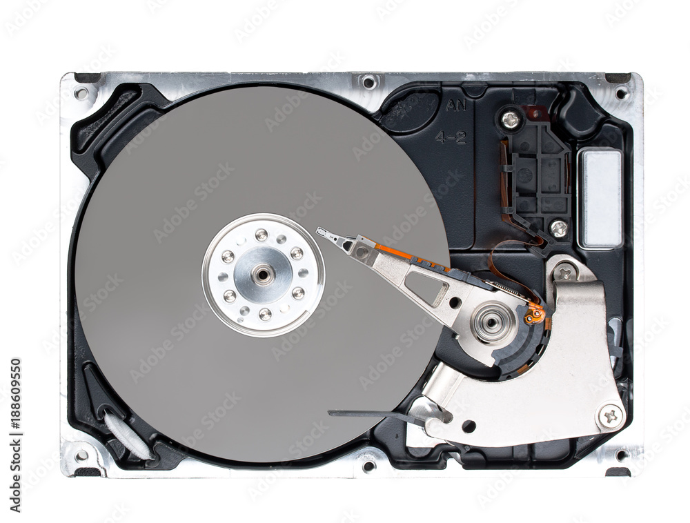 Computer hard disk drive (HDD) with opened cover isolated on white background. Top view, close up. Computer hard disk drive (HDD) with opened cover isolated on white background. Top view, close up.