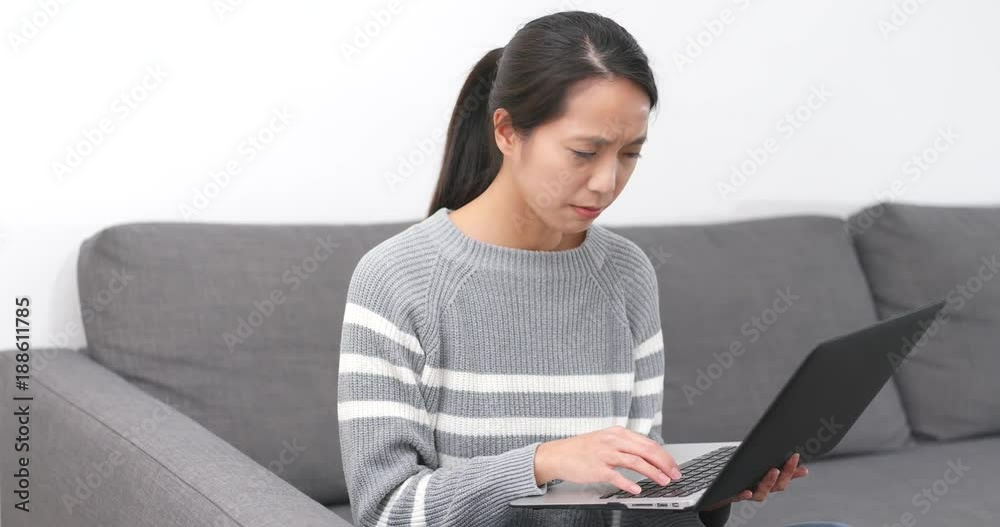 Woman working on laptop computer at home Woman working on laptop computer at home