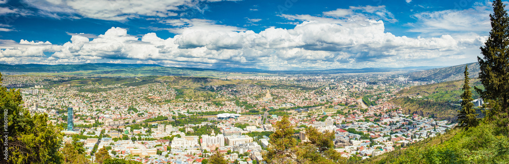Tbilisi, Georgia. Scenic Aerial View, Panorama, Cityscape With Beautiful Blue Sunny Sky