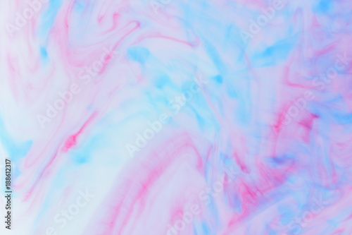 Pink blue abstract background on liquid  pink minimalistic background  pink blue pattern  pastel texture for designer  background preparation  colorful stains on milk  art