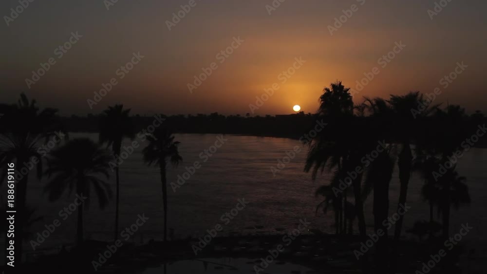 Sunset Over River Nile; Road To Luxor & Nile Sunset; Nagaa Abou Youssef, Egypt Sunset Over River Nile; Road To Luxor & Nile Sunset; Nagaa Abou Youssef, Egypt