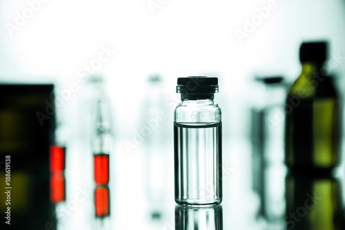 Group of ampoules with a transparent medicine in medical laboratory