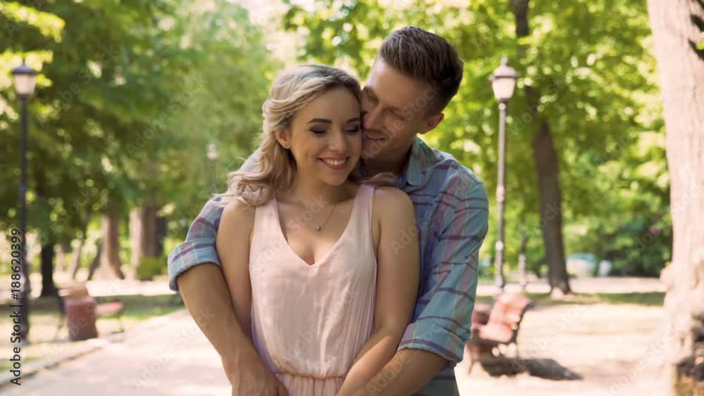 Lady with excitement waiting for her boyfriend sincerely rejoicing seeing him Lady with excitement waiting for her boyfriend sincerely rejoicing seeing him