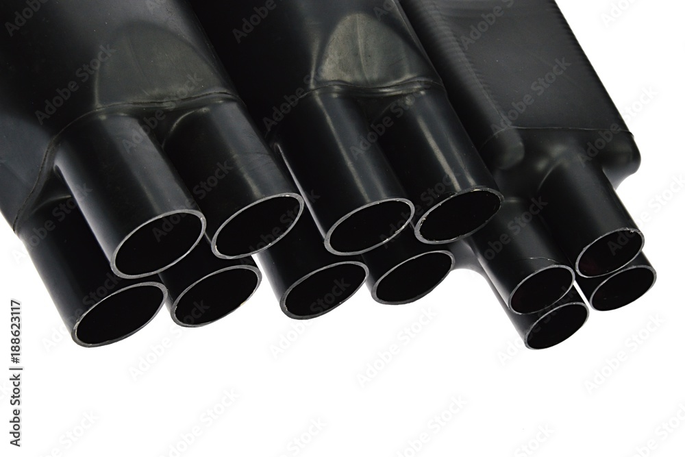 Fototapeta premium Funnel looking black rubber shrinkable cable breakout boots of various diameters, white background