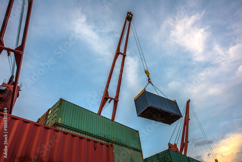 container unit carry on lifting by the ship crane storage to the bay accommodation on the sequency of destination  transportation photo