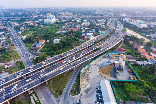 Aerial view of Traffic and Highway on suburban area