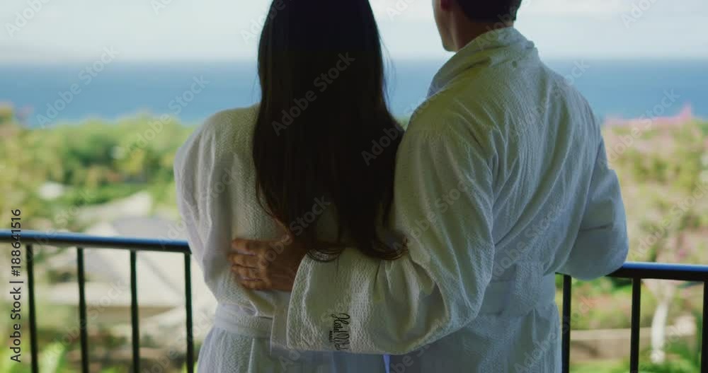 Couple relaxing enjoying morning on vacation at luxury hotel