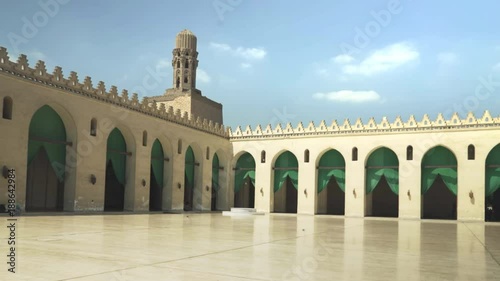 panning shot of the al hakim mosque's courtyard in cairo, egypt photo
