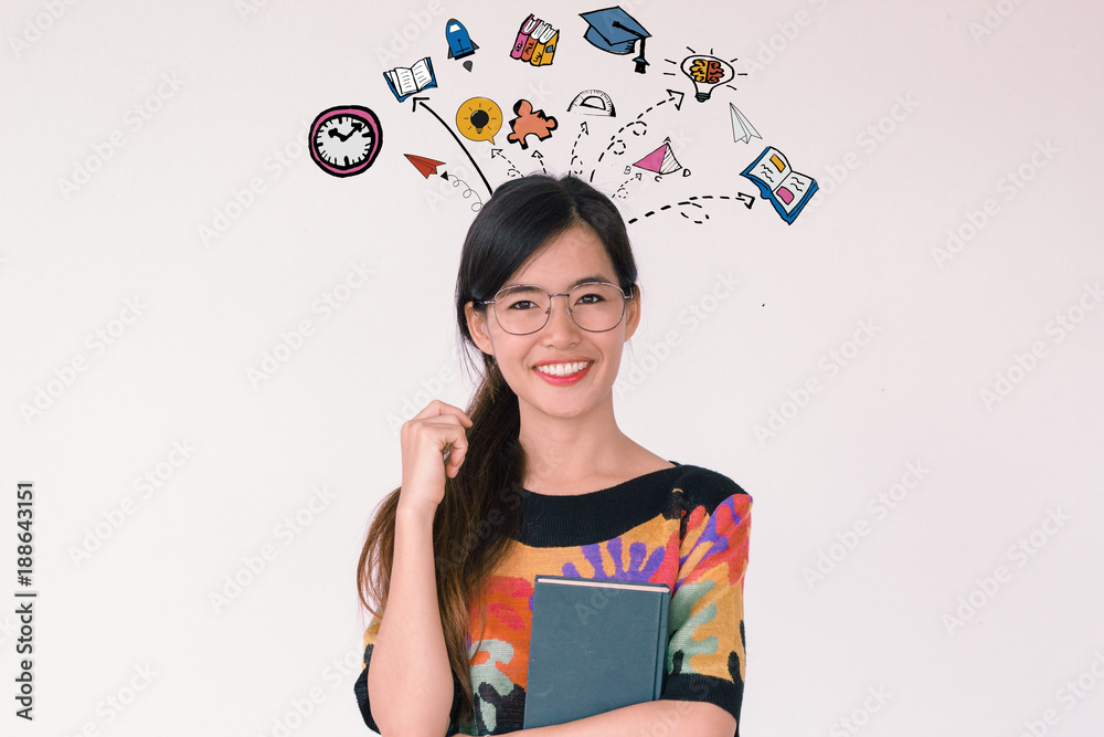 Back to school and education concept: A portrait of young asian student smiling with education and learnining doodles icon. Back to school and education concept: A portrait of young asian student smiling with education and learnining doodles icon.