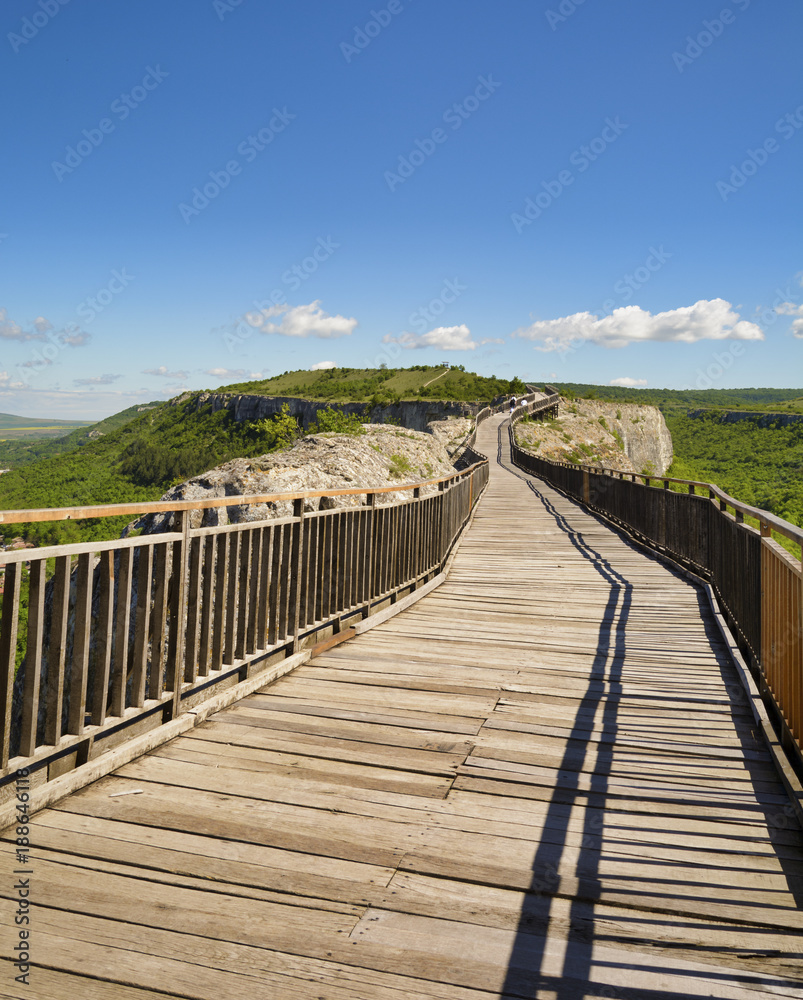 Wooden bridge and Gate of ancient fortress. Ovech Fortress, Provadia, Bulgaria