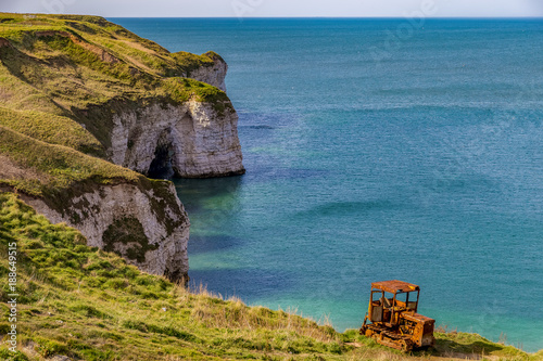 Old rusty crawler and cliffs, Flamborough North Landing near Bridlington, East Riding of Yorkshire, UK photo