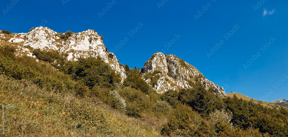 Monte Baldo. Italy. Walking one-day hikes through narrow stony paths.