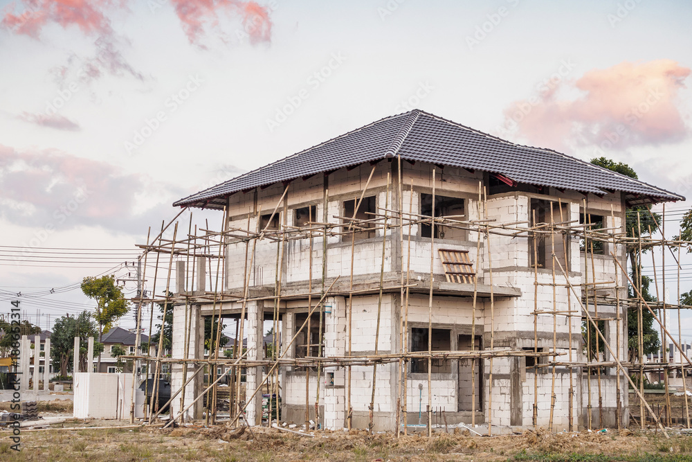 construction residential new house in progress at building site construction residential new house in progress at building site