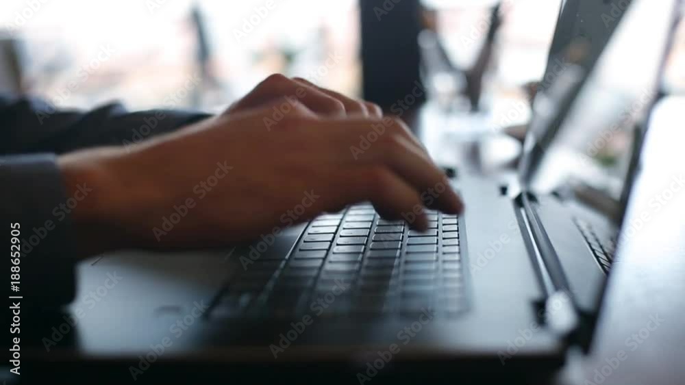 custom made wallpaper toronto digitalCamera slides around freelancer's hands typing on laptop keyboard in cafe. Businessman working at office with internet. Man searches new job on internet at coffeeshop. Business concept.