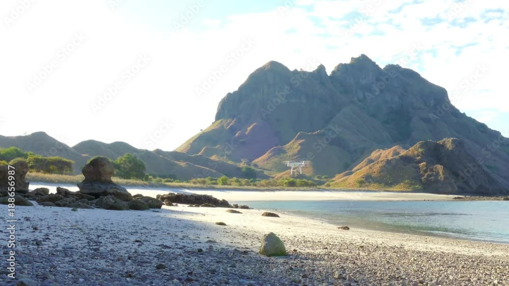 Drone pilot with high resolution camera flying over padar island in Komodo, Indonesia. zoom in Drone pilot with high resolution camera flying over padar island in Komodo, Indonesia. zoom in