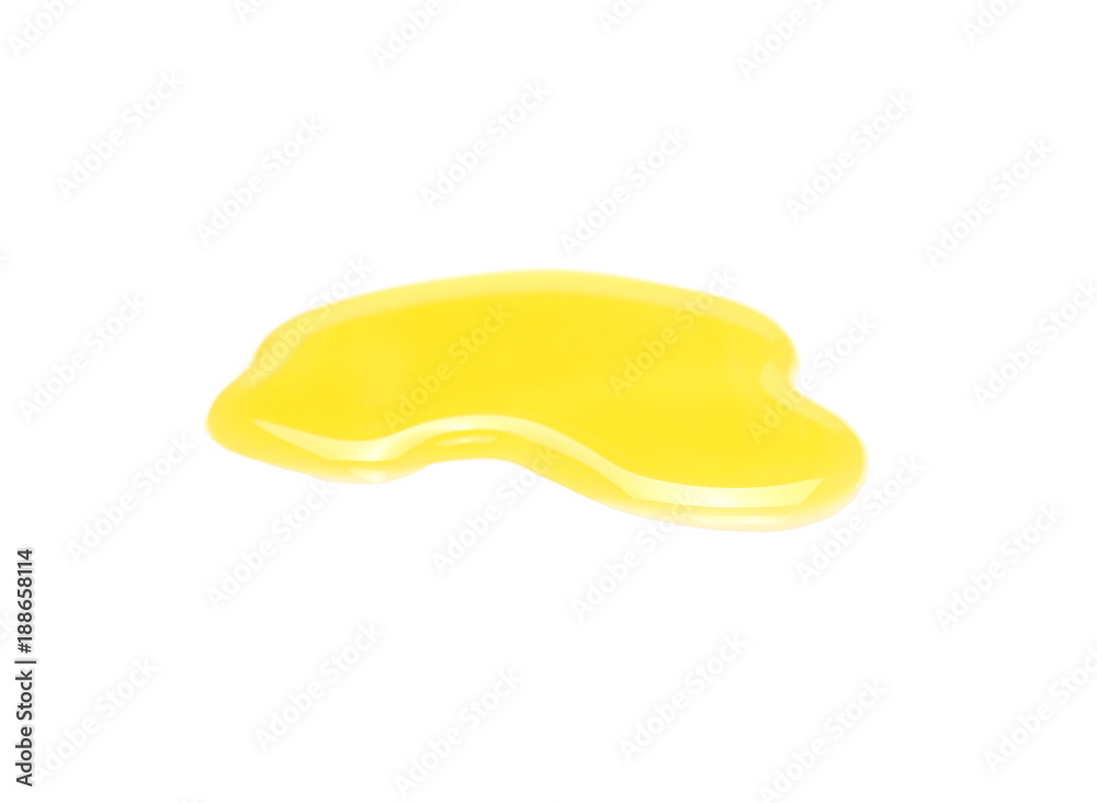 Puddle of orange juice isolated on white background, clipping path