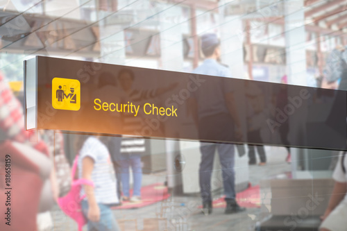 Double exposure of security check airport sign ,Airport security check at gates with metal detector and scanner photo