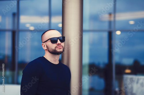portrait of a handsome bearded man in sunglasses. copy space © jozzeppe777