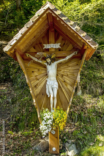 Wooden cross with figure photo