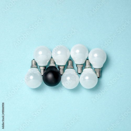 One light bulb outstanding,glowing different.business creativity idea concepts.flat lay design