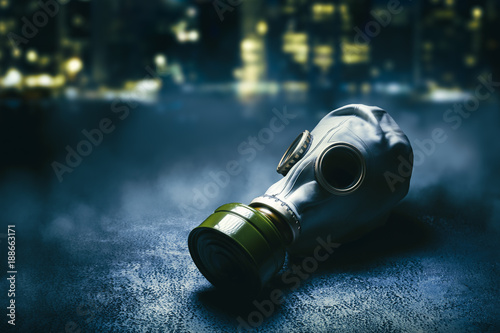 Gas mask with a smoky background
