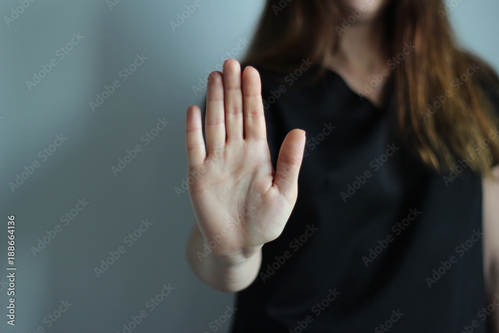 Woman's Hand Showing Reject, Stop, Break, Pause Gesture Woman's Hand Showing Reject, Stop, Break, Pause Gesture